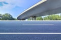 Asphalt roads and city buildings under the overpass, automobile advertising road material.